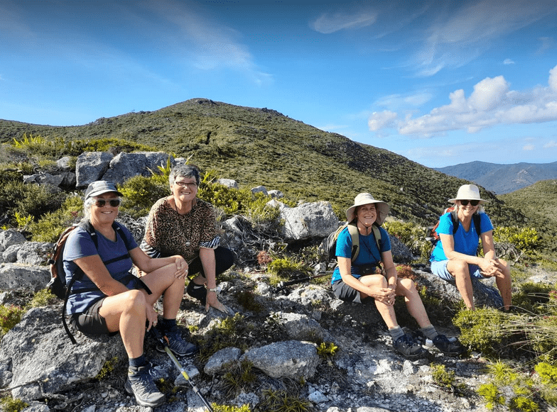 Te Ahumata Peak Great Barrier Island, four female trampers